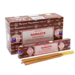 Hand-rolled Satya Incense sticks in a vibrant packaging, perfect for creating a calming atmosphere.