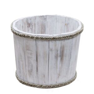 Compact whitewashed wooden storage tub for organising household items.