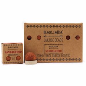 Banjara smudge beads made from sandalwood for aromatic cleansing.