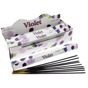 Violet Premium Incense sticks in a stylish holder, creating a calming atmosphere.