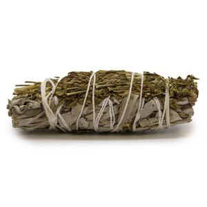 White sage and ruda smudge stick for cleansing and purifying spaces.