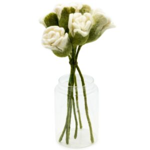 Set of six handcrafted white felt roses for home decor and crafting.