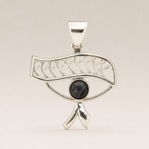 Silver plated eye-shaped pendant with dark iolite stone at the centre.