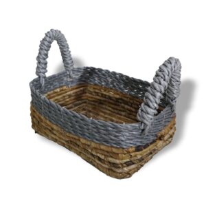 Set of three square baskets made from banana leaf and raffia.