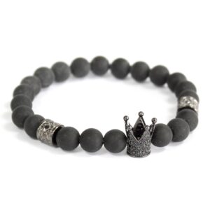 Black agate gemstone bracelet with an angel wing charm for protection.