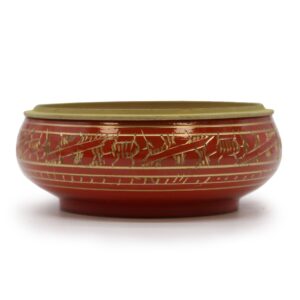 Handmade red charcoal incense jar with golden patterns for rituals.