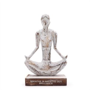 Whitewashed wooden yoga lady in easy pose with inspirational quote.