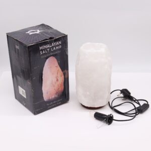 Himalayan salt lamp with a warm glow, perfect for home decor and relaxation.
