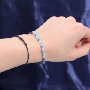 Zodiac Crystal Candle with a gemstone bracelet for Pisces, featuring calming colours and design.