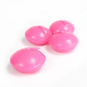 Small pink floating candle ideal for romantic displays at weddings.