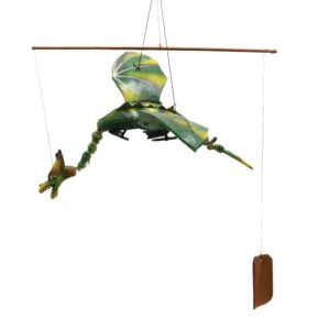 Handmade green coconut dragon mobile with impressive wingspan for garden display.