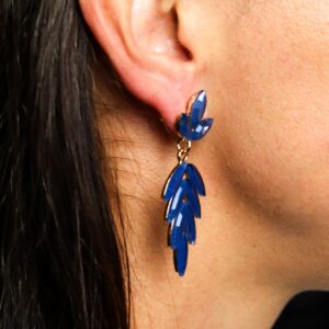 Elegant long drop earrings featuring deep blue glass and stainless steel.