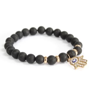 Black agate gemstone bracelet with an angel wing charm for protection.