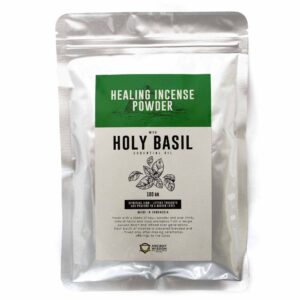 Holy Basil incense powder in a decorative bowl, ready for use.