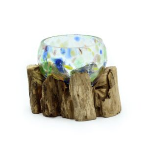 Small decorative bowl made of vibrant hand-blown glass on a natural wood base.