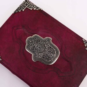 Hefty Red Tan Book with decorative zinc hamsa hand on the cover, 200 pages.