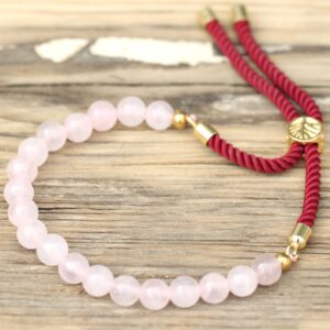 18K gold plated bracelet featuring rose quartz on a colourful string.