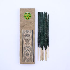 Ritual Resin on Stick - Arruda incense sticks in a natural setting.