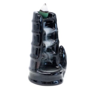 Elegant backflow incense burner designed to create cascading smoke effects.