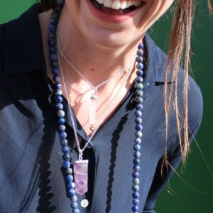 Amethyst gemstone flat pencil pendant with a polished finish.