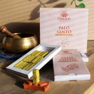 Pack of 15 Palo Santo incense smudge bricks with terracotta burner for calming rituals.