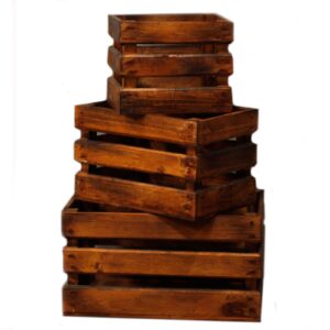 Set of three rustic wooden storage crates in warm brown finish.