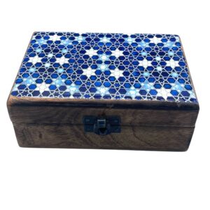 Ceramic glazed wood box in blue with star design, perfect for storage.