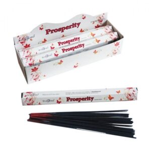 Hexagonal incense sticks in a stylish holder, perfect for creating a calming atmosphere.