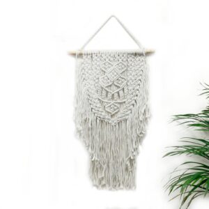 Handcrafted macrame wall hanging with a boho design for home decor.