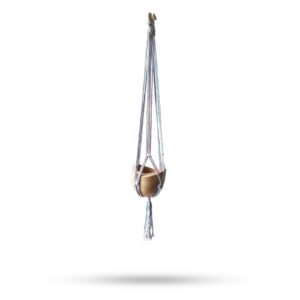 Macrame pot holder in pastel tones, perfect for a bathroom or meditative space.