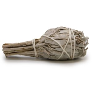 White sage smudge stick torch for cleansing and creating a calming atmosphere.