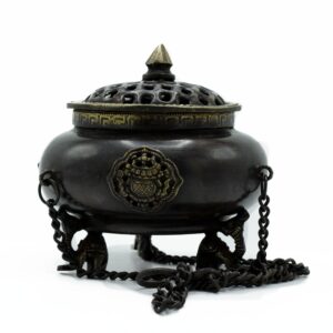 Handcrafted large brass Tibetan burner with four celestial symbols.