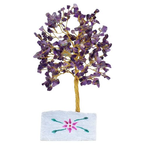 Handmade amethyst gemstone tree mounted on a natural rock base.