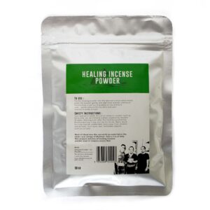 Holy Basil incense powder in a decorative container for aromatic use.