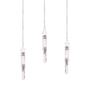 Clear rock quartz pendulum with silver-tone detailing for meditation and energy work.