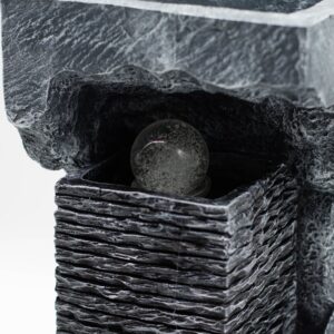 Elegant water feature with a colour changing crystal ball and rock design.