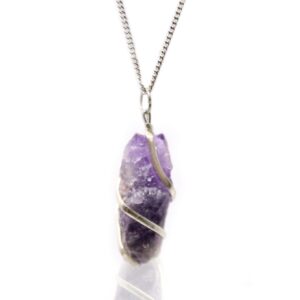 Raw amethyst gemstone necklace with unique imperfections and cascade wire wrapping.