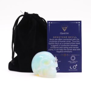Large Opalite gemstone skull with an ethereal glow, perfect for home decor.
