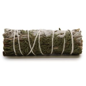 Smudge stick made with white sage and cedar for cleansing spaces.