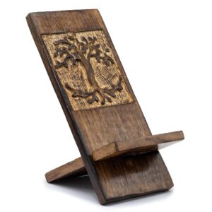Hand-carved wooden phone stand with Tree of Life design, showcasing unique grain.