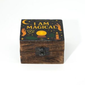 Small mango wood box with an enamelled lid featuring magical symbols and a starry design.
