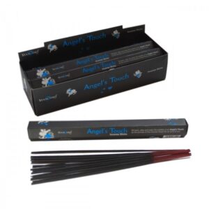 Angel's Touch Incense Sticks in a decorative holder, emitting a calming aroma.