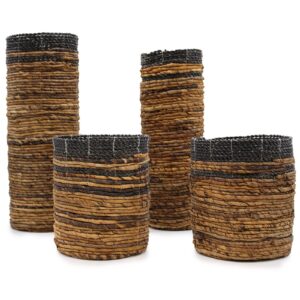 Elegant banana leaf design vases and bins for home decor.