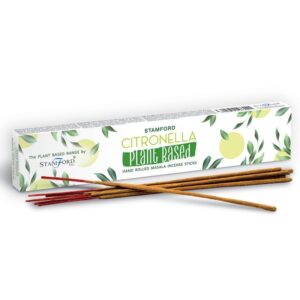 Plant based citronella incense sticks in a natural setting.