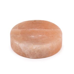 Round Himalayan salt cooking plate, perfect for grilling and serving.