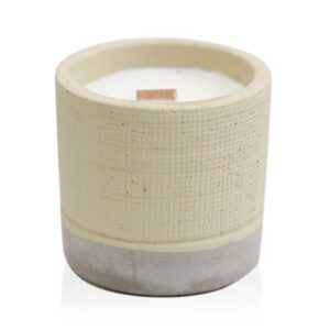 Grey concrete candle pot with wooden wick, perfect for home decor.