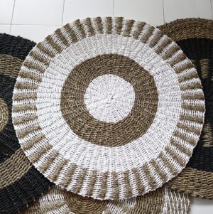 Round seagrass decor in white and tan, perfect for home styling.