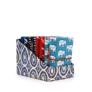 Assorted block print notebooks in vibrant colours, perfect for writing and sketching.