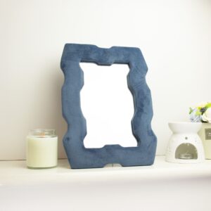 Royal Blue Soft Squiggly Mirror with a chunky frame and plush velvet finish.