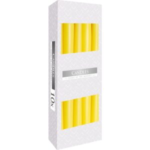 Bright yellow taper candle adding warmth to a cosy setting.